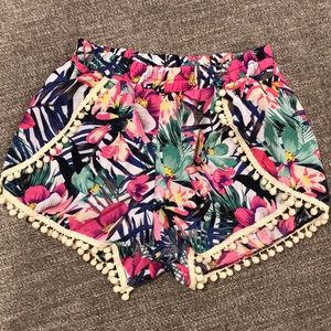 Tropical shorts with flaps. size medium.